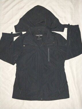 Calvin Klein women’s black jacket, size Small with Hood, full Zipper.